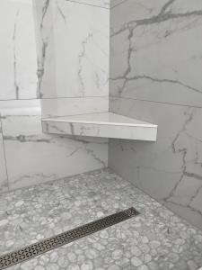 Marble Herringbone Master Bath